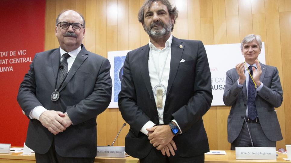 Josep Eladi Baños i Òscar Camps després de rebre la medalla 